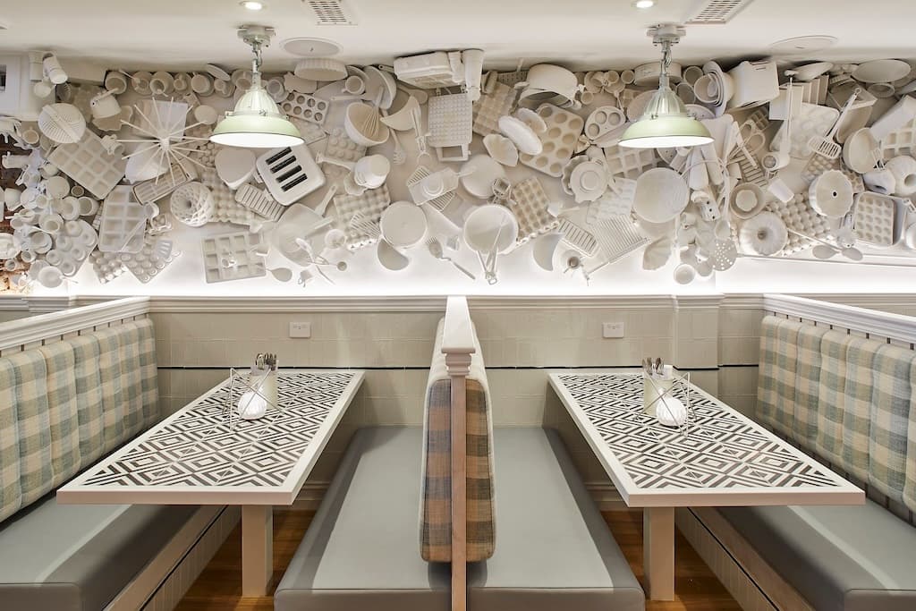 Frankie B's Food House Parramatta Booth Seating with Artistic Wall Decor – cosy and stylish